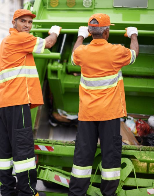 Man Putting junk in a junk vehicle providing service in washington DC